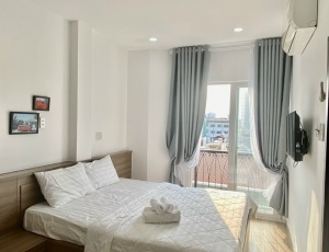 BRIGHT MINIMALIST APARTMENT IN DISTRICT 1, TRAN NHAT DUAT STREET